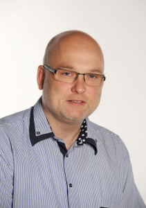 JUDr. Miloš Tuháček